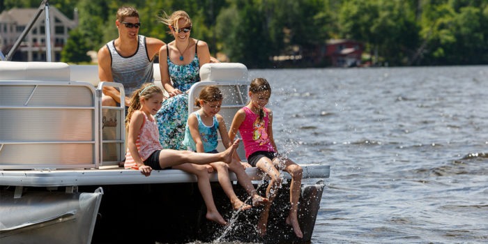 A family on a pontoon boat.