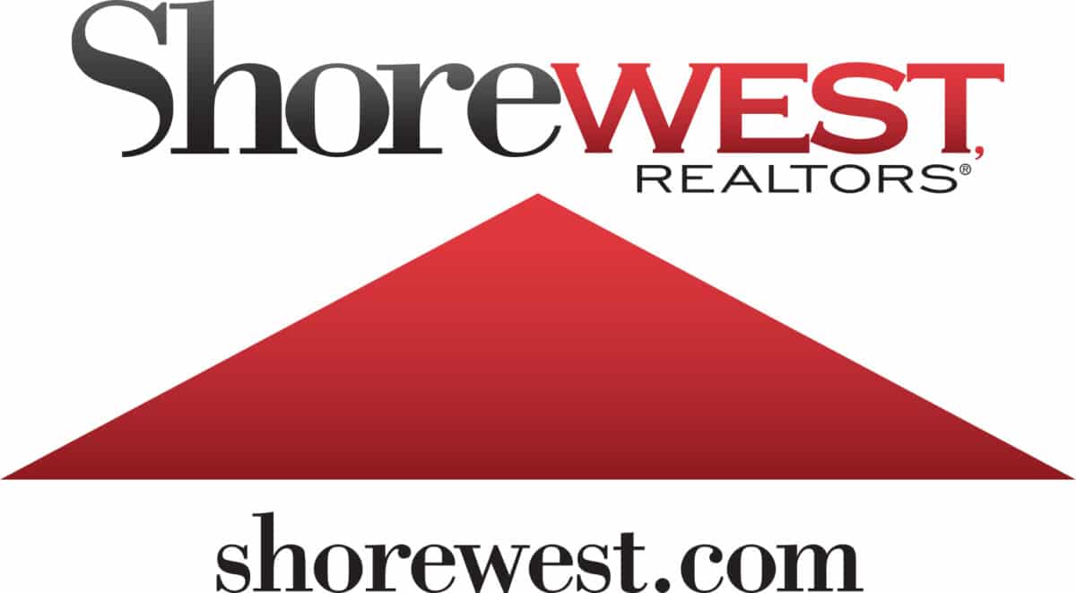 The Shorewest Realtors logo showcases the company name in black and red text above a striking red triangle, with their website shorewest.com elegantly displayed underneath.