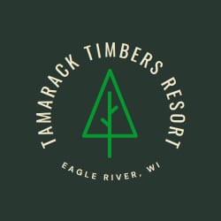         Logo for Tamarack Timbers Resort in Eagle River, WI, featuring a stylized green tree inside a circle of text that beautifully captures the resort's natural charm.