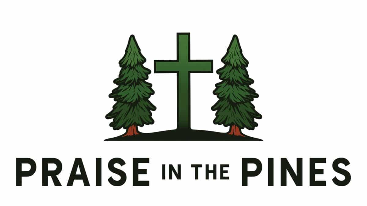 Logo featuring a green cross flanked by two pine trees, with the text "PRAISE IN THE PINES" below.