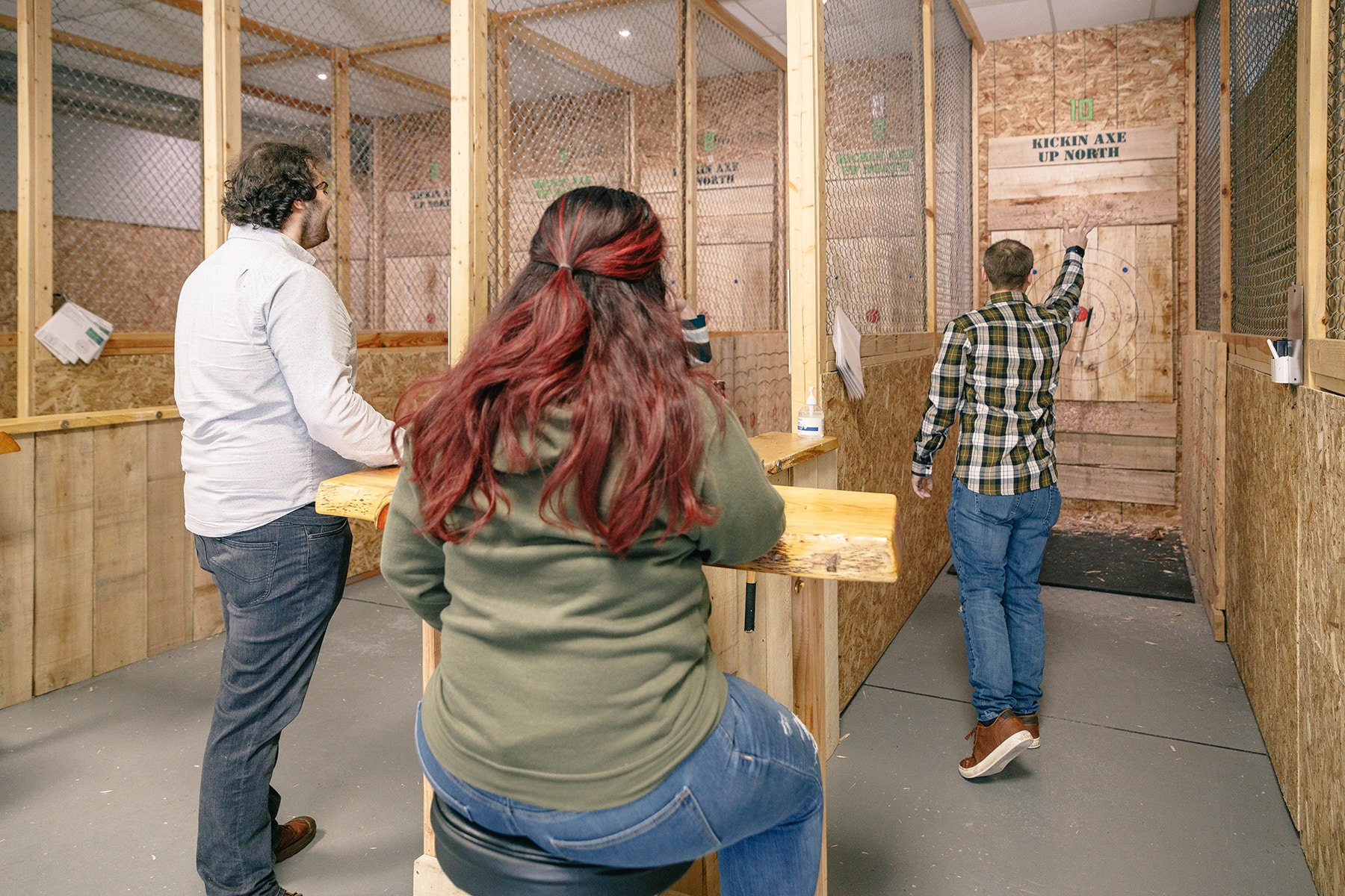 A group of people in a shooting range.