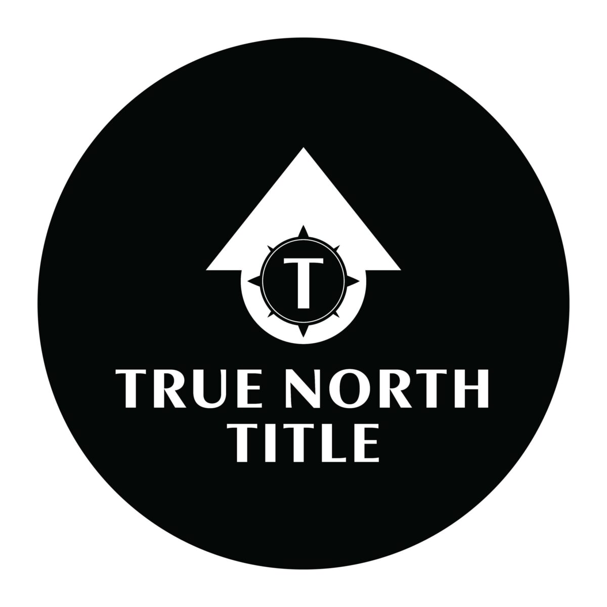 TrueNorthTitleLogo2025_black Black circular logo with a white upward arrow, a compass with "T" inside, and the text "TRUE NORTH TITLE" in bold white letters below the arrow.