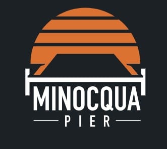 Logo for "Minocqua Pier" featuring an orange semi-circle with horizontal lines above a stylized white pier and bold white text on a dark background.