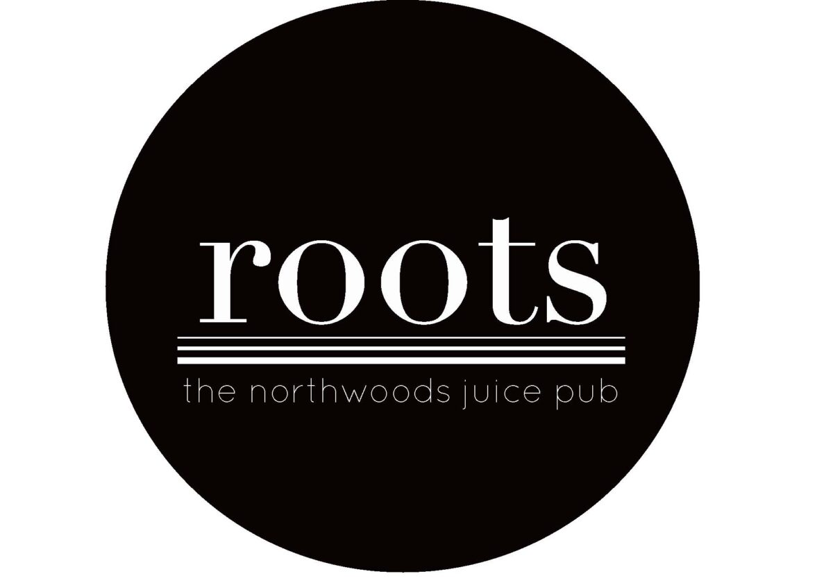 Black circular logo with the word "roots" in large white letters above horizontal lines and the text "the northwoods juice pub" in smaller white letters below.