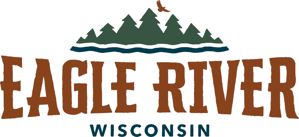 Logo for Eagle River, Wisconsin, featuring stylized trees, a flying eagle, wavy lines, and bold text.