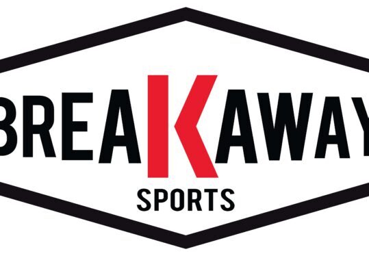Logo for "Breakaway Sports" with the letter "K" in red and larger font, inside a black hexagonal border.