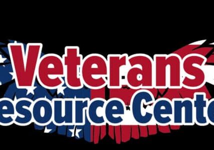 Logo for the Veterans Resource Center featuring stylized, outspread wings with an American flag pattern behind the text.