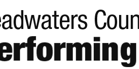 Logo of Headwaters Council for the Performing Arts, featuring text and a stylized figure holding a circular emblem with musical notes, representing the spirit of our vibrant art center.