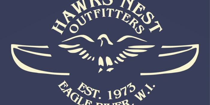 Logo for Hawks Nest Outfitters featuring an eagle with outstretched wings above two canoe shapes. Text reads: "Hawks Nest Outfitters, Est. 1973, Eagle River, WI.